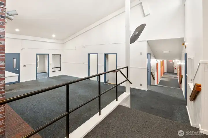 Stairs to the bedrooms and bonus rooms