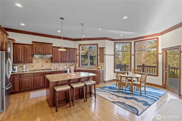 Wonderful flow in the kitchen workspace with an entrance to the upper deck