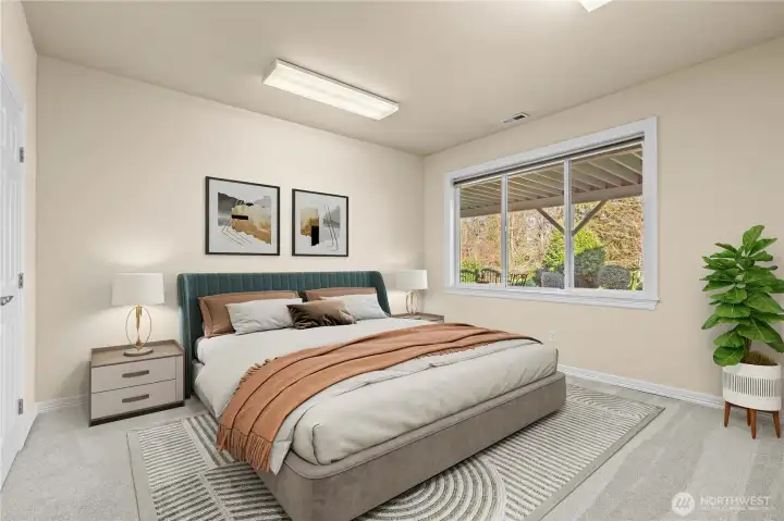 Virtually staged, this is one of the 3 lower level rooms, featuring tall ceilings