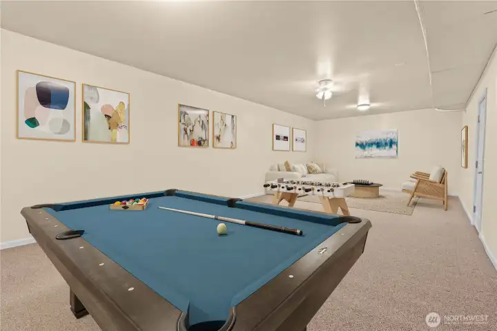 This fully finished room is virtually staged as a game room to show the possibilities if the space