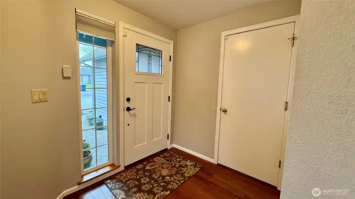 Entry is a welcoming area to greet your quests...and the perfect place for your guests to leave any personal items they don't want to bring into the home...shoes, umbrellas, etc!