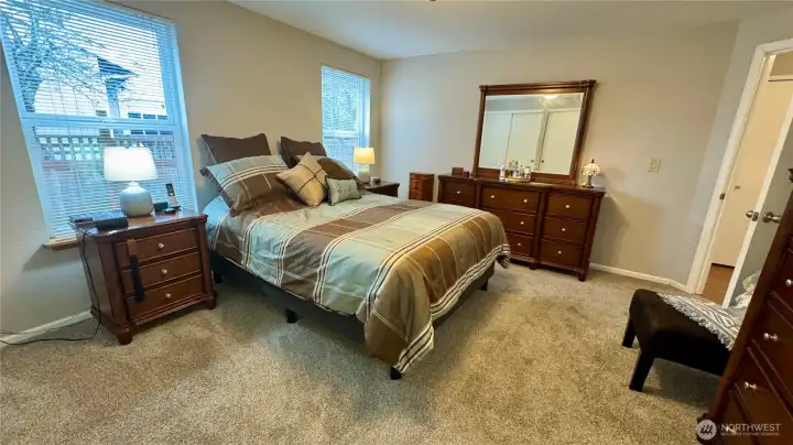 Primary Bedroom is VERY SPACIOUS with newer carpet and updated 3/4 bath!