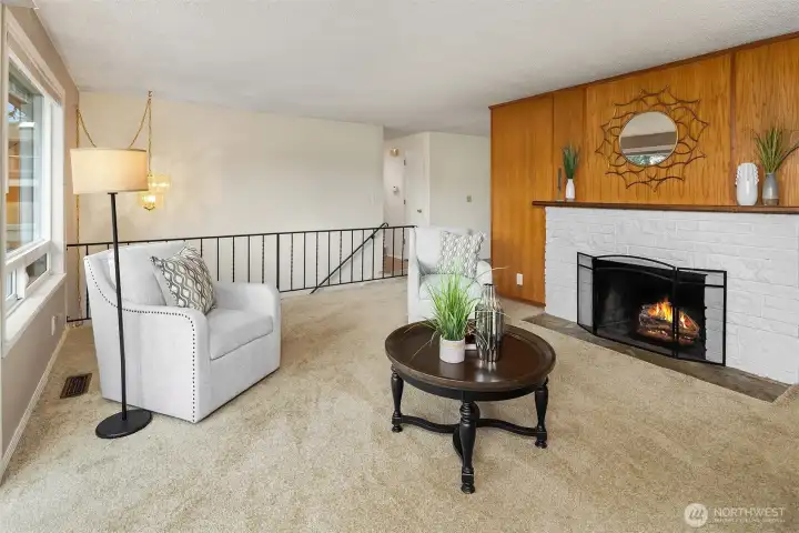 Wood burning fireplace. House is hooked up to natural gas so fireplace could be converted to gas.