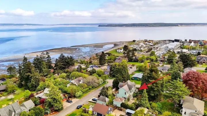 Aerial shot with arrow showing home's location.