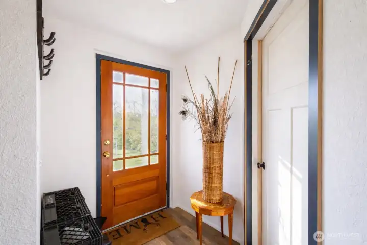 Bright entry with immediate access to attached shop.