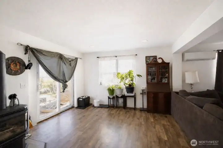 Inviting living space with propane fireplace and easy access to outdoor living.