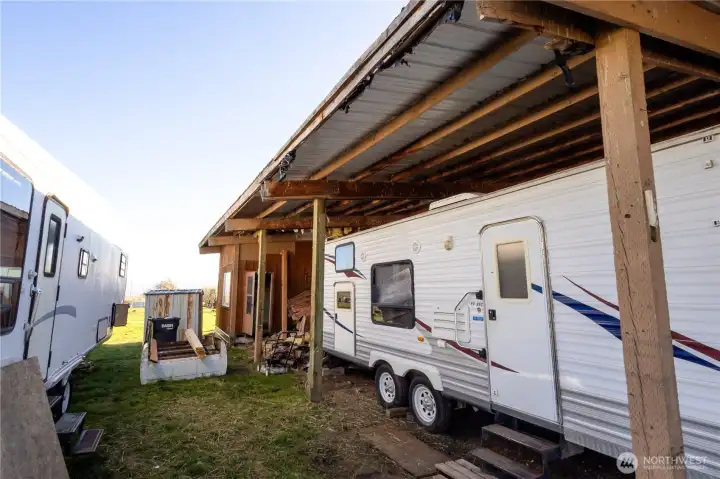 Additional parking available with attached carport.