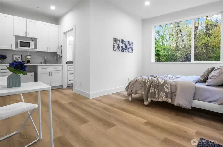 Private ground floor suite with attached bathroom and kitchenette.