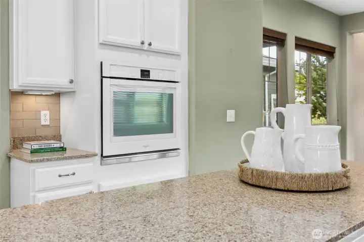 Wall oven, pull outs in lower cabinets and large pantry