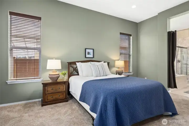 Primary bathroom has new laminate tile flooring