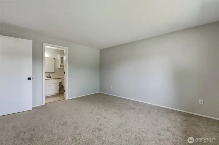 Another view of primary bedroom ...