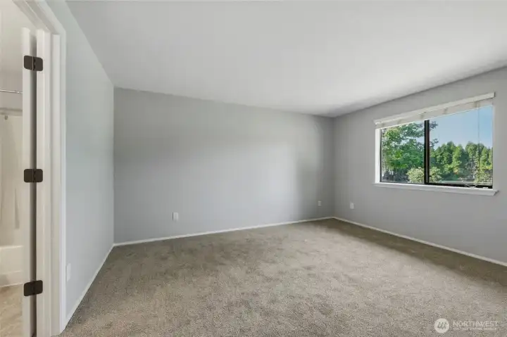 Another view of primary bedroom ...