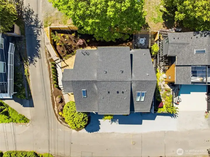 fenced side yard on west side of house provides space for gardening