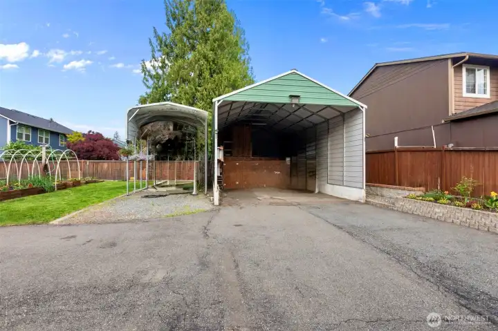 20x40 shop has fully-lift system to store quads/bikes/ outdoor toys in upper bay