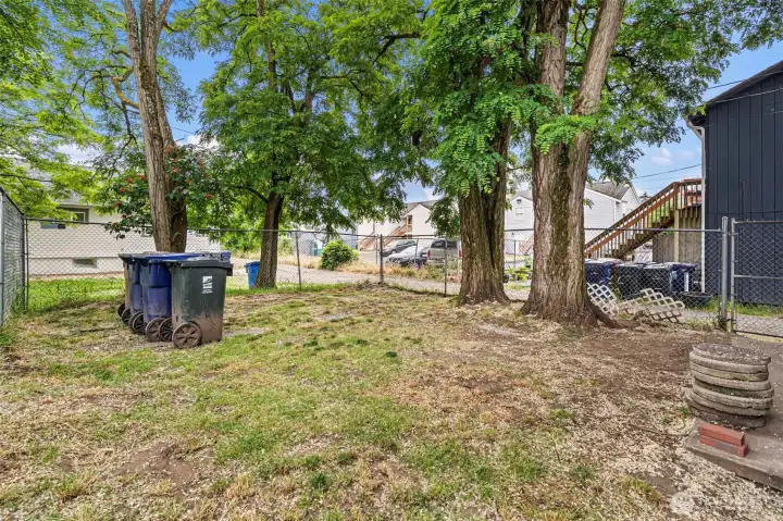 Fully fenced flat back yard. Fully fenced flat back yard.