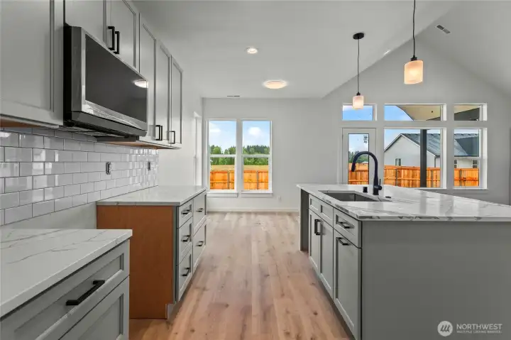 This is a newly completed Plan 1378. Photo is used as reference.
