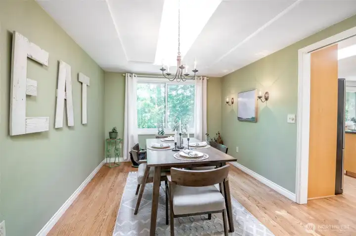 Formal dining has hardwoods for easy cleaning