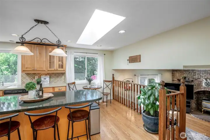 Semi- open kitchen to sunken, secondary living space