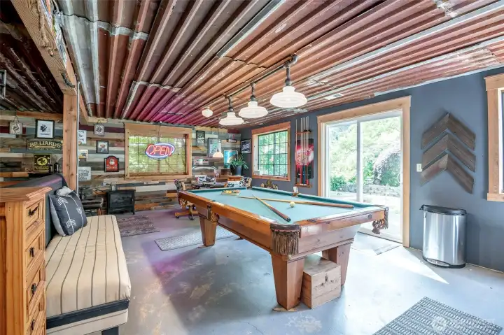 owner repurposed the materials for metal roof and glass lighting.
