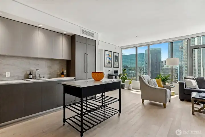 This unit rests on the 20th floor.  Its open and bright floor plan has hardwood floors throughout.
