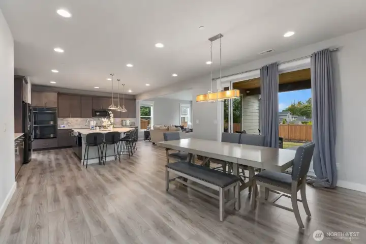 Sliding glass doors from the dining area AND the living area!