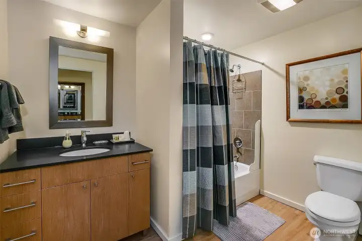 The guest suite has a cute as a button en suite bath. The guest suite has a cute as a button en suite bath.