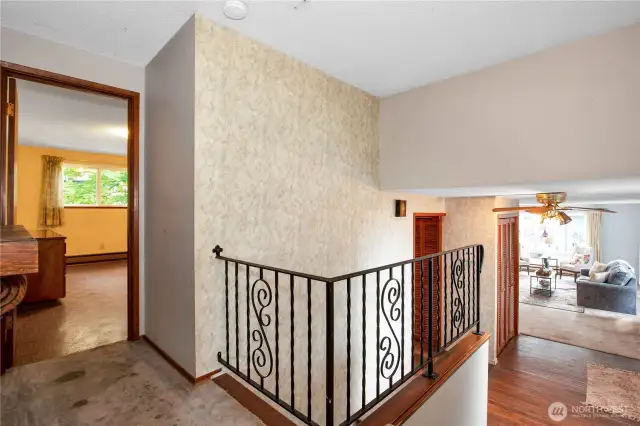 The original rod iron railings adds to the retro feel of this home.