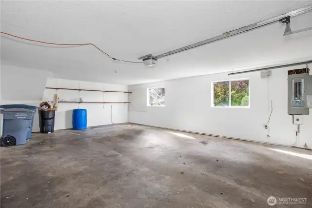 The two car garage is deep and have rooms to store your toys and tools.