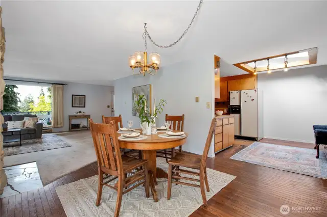 The dining room has room for a large table and many guests. The kitchen has room for an additional table should you want to have a breakfast nook. This area could also be used to make the kitchen larger if you feel like remodelling.