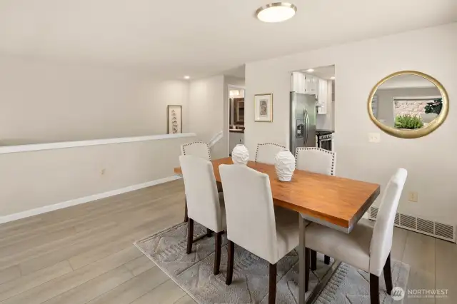 Dining space between kitchen and great room