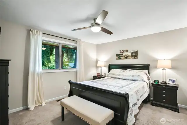 Primary bedroom with and on-suite 3/4 bathroom with double sinks.