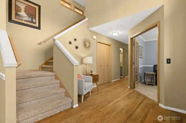 Step inside and feel the difference. Soaring ceilings, rich hardwoods.