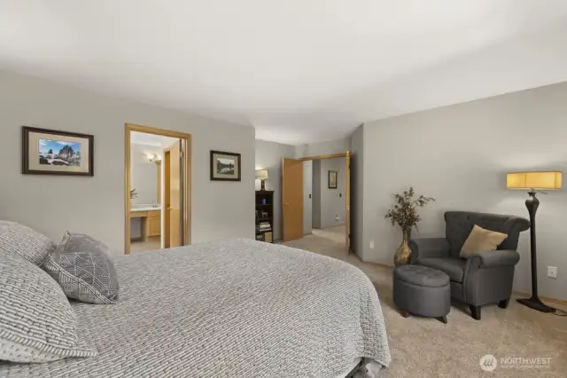 The primary suite features a spacious walk-in closet and a private 5-piece bath.