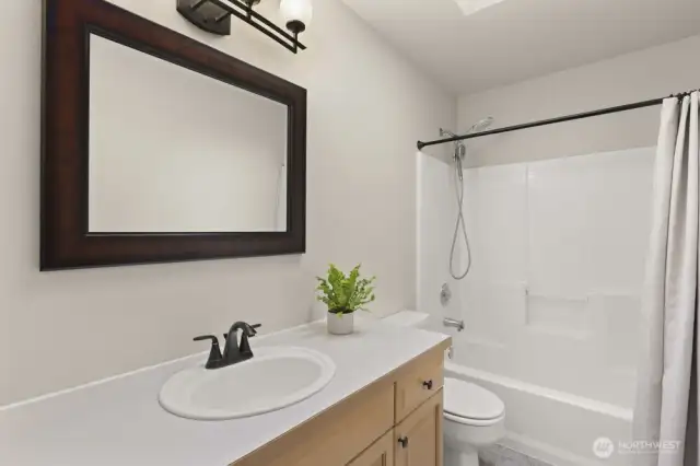 Upstairs also includes a full bath conveniently located near the secondary bedrooms.
