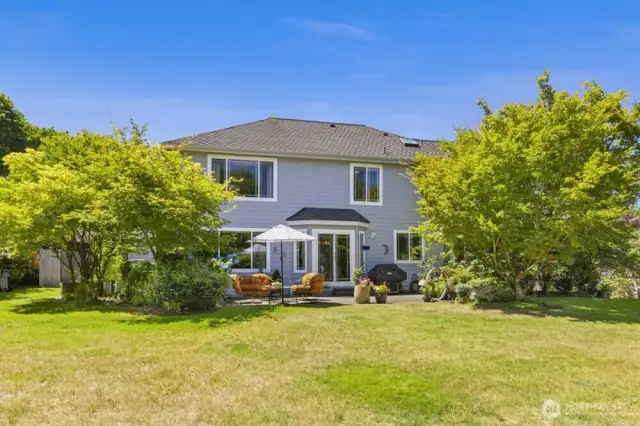 Outside, enjoy the serenity of a 15,885 sq ft lot—private, quiet, and surrounded by lush greenery.