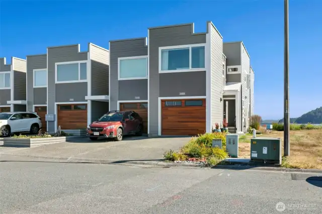 New siding, new garage doors and new windows for this complex.