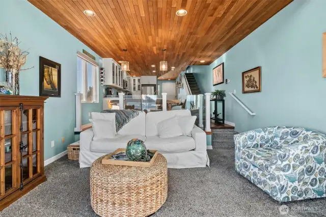Plush carpet, warm wood floors and ceilings, perfectly paired with beach glass paint schemes.