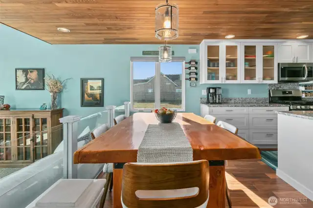 The elevated eating area hovers between the kitchen and the great room for optimal views South or to the West.