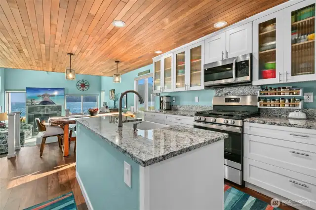 The sellers maximized the storage with many cabinets and new stainless steel appliances.