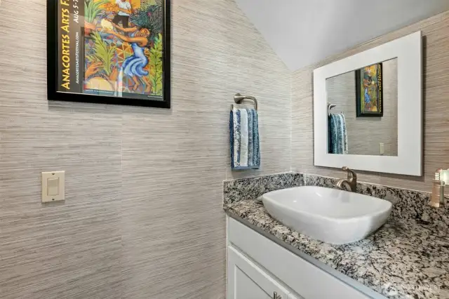 Here is the updated, main floor powder room.