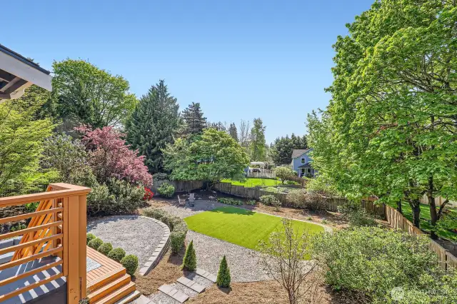 Enormous fully-fenced backyard. Beautiful and low maintenance!