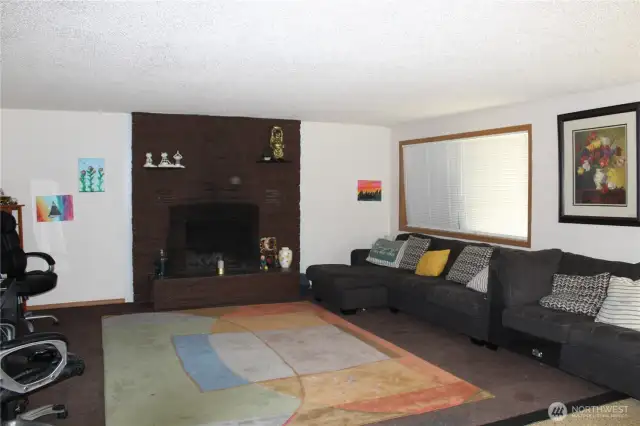 Living room with wood fireplace