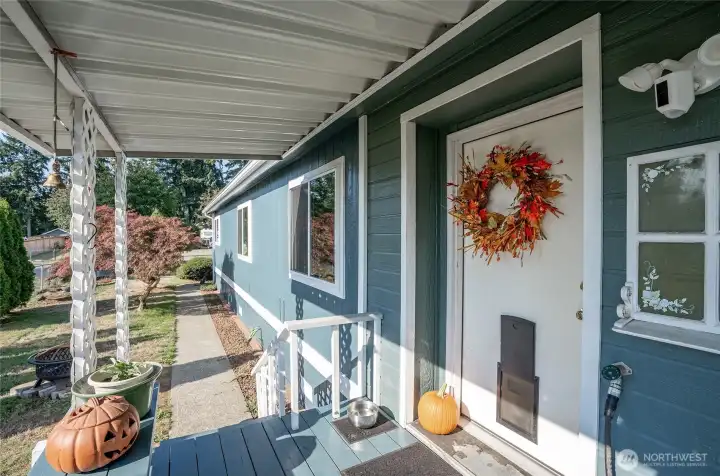 A welcoming front porch, perfect for morning coffee or enjoying peaceful evenings.