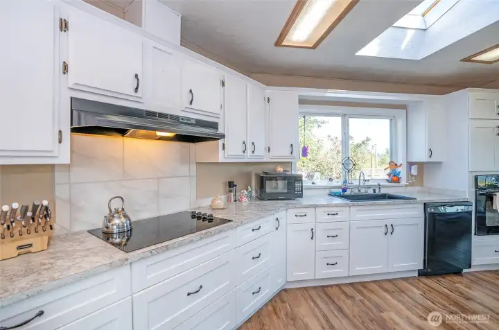 Modern kitchen designed for function and style with stainless-steel appliances.