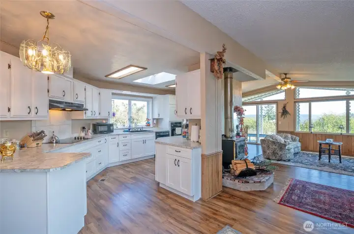 Ample cabinetry and sleek, spacious counters create an ideal setting for effortless meal prep and entertaining.