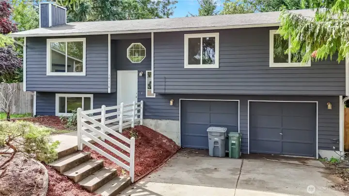 Freshly updated and move-in ready—this welcoming home with a big fenced yard is perfect for all.