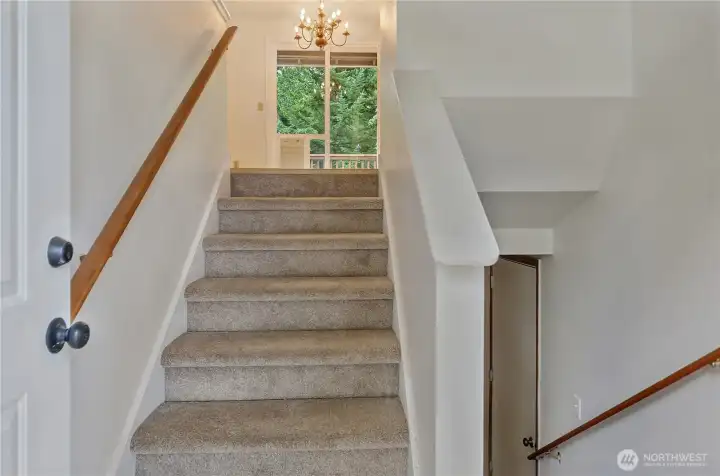 Step inside and you’re greeted by a classic split-level entry, offering an inviting flow that leads you upstairs to the bright and open main living area or downstairs to the spacious daylight basement.