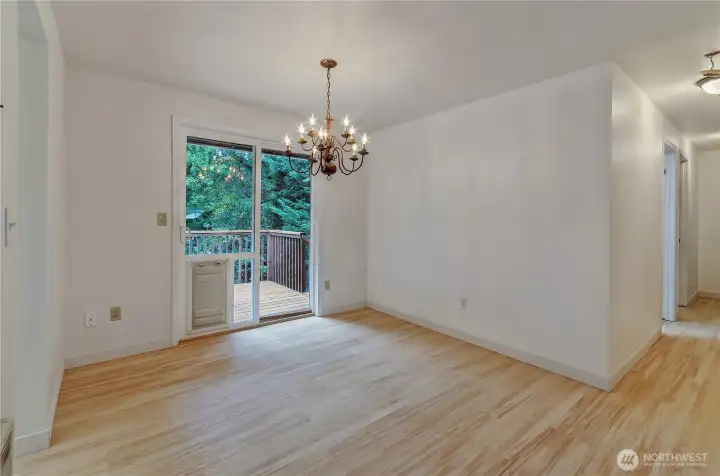 Dining room with sliding door to outside deck.