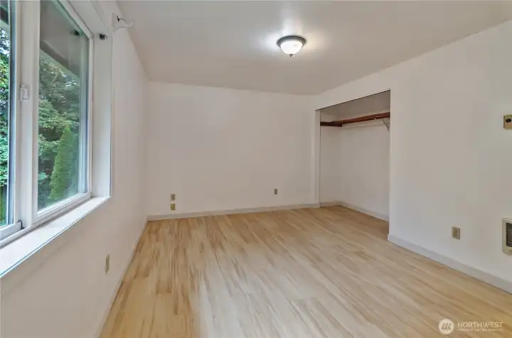 Primary suite - lots of light with newly updated bathroom.