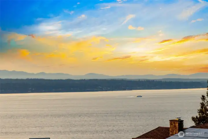 Expansive Puget Sound views stretch across the horizon, preserved by neighborhood CCRs that protect this rare outlook. The setting captures both the serenity of the water and the beauty of the surrounding landscape, offering a calming backdrop that remains safeguarded for years to come.